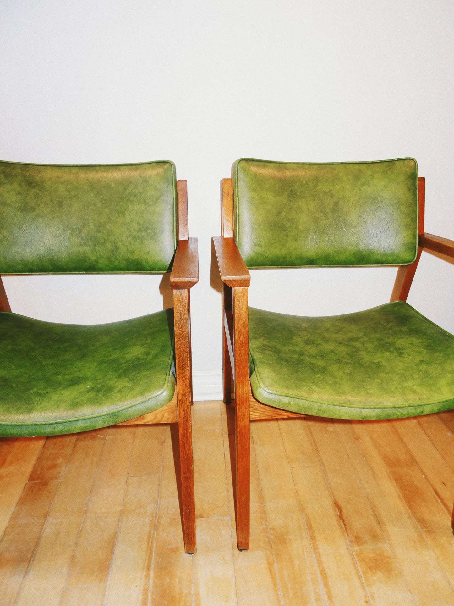 Pair of Mid Century Genuine Leather Accent Chairs