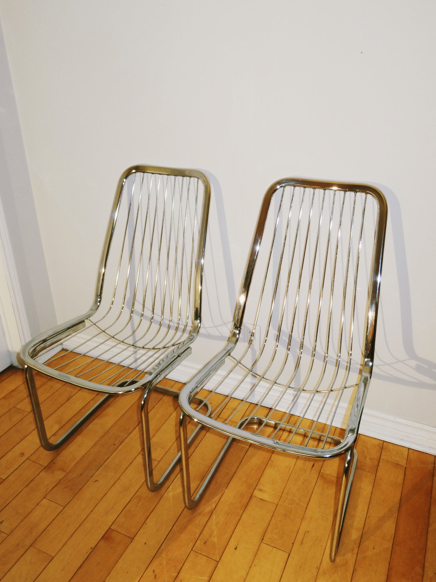 Pair of Vintage Gaston’s Rinaldi Replica Chrome Chairs