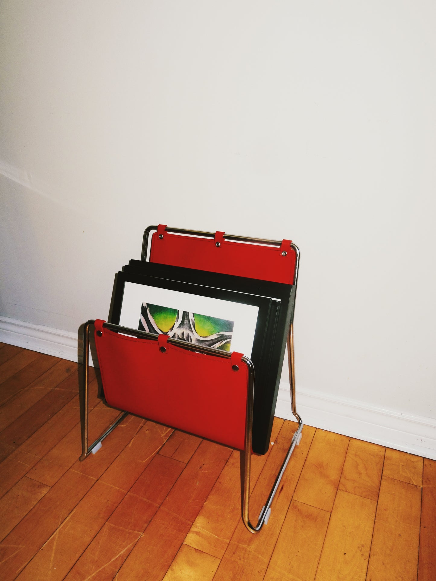 Red Leather and Chrome Magazine Rack