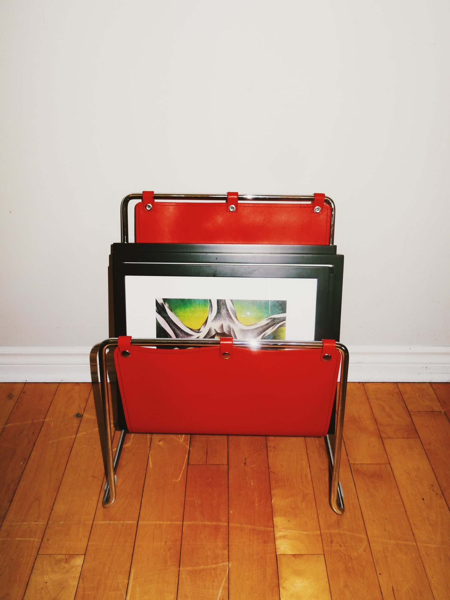 Red Leather and Chrome Magazine Rack